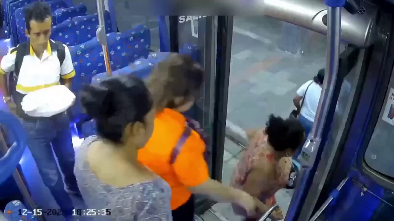 inattentive bus driver and distracted woman