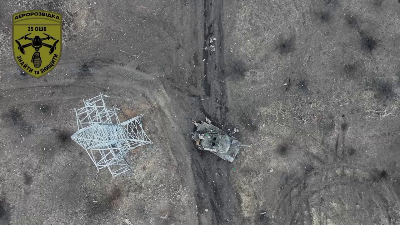 hide near the damaged Abrams