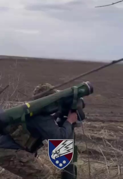 military with Javelin ATGM hits enemy tank