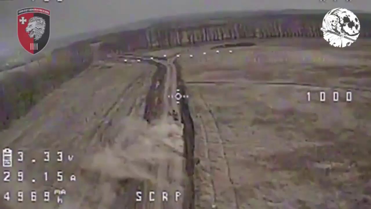 FPV drone flies over armored personnel carrier